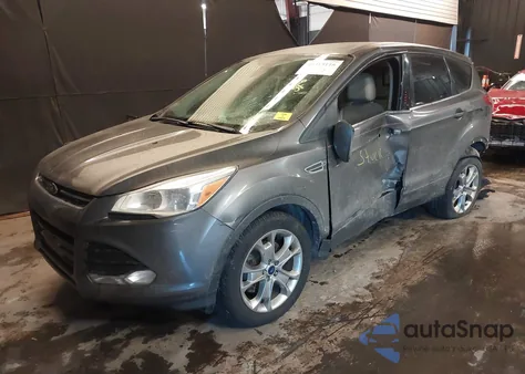 2013 Ford Escape Sel z USA, uszkodzony, nr VIN 1FMCU9H9XDUD74991